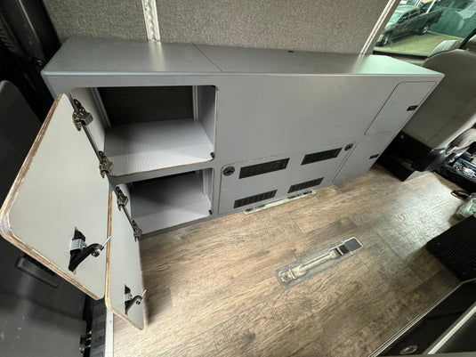 PowerKit cabinet installation over wheel well Sprinter with storage