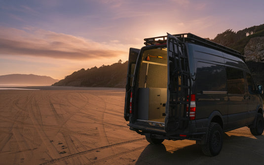 Skyliner van at sunset on beach